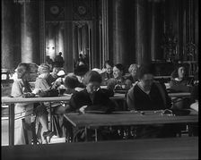 Buckingham Palace Hosting a Sewing Group. Large Numbers of Women Sewing or Knitting, 1940. Creator: British Pathe Ltd
