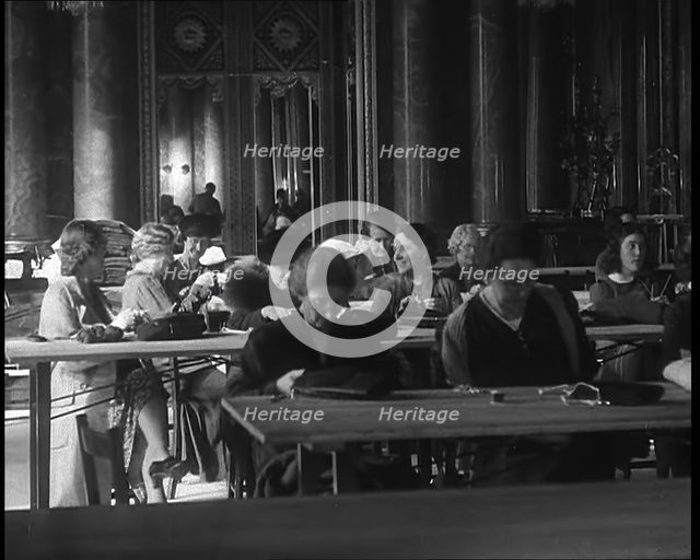 Buckingham Palace Hosting a Sewing Group. Large Numbers of Women Sewing or Knitting, 1940. Creator: British Pathe Ltd.