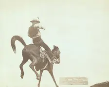 Bucking Bronco Ned Coy, a famous Dakota cowboy, starts out for the cattle round-u..., 1888. Creator: John C. H. Grabill