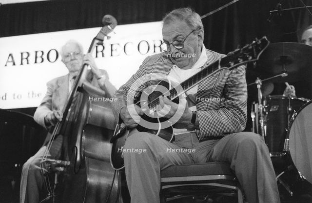 Bucky Pizzarelli, The March of Jazz, Clearwater Beach, Florida, USA, 1997. Creator: Denis Williams.