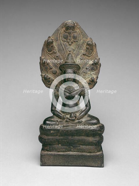 Buddha Enthroned on a Serpent (Naga), Angkor period, early 13th century. Creator: Unknown.