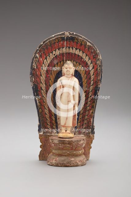 Buddha Standing with Hand in the Gesture of Reassurance (Abhayamudra) with...(1480-1815). Creator: Unknown.