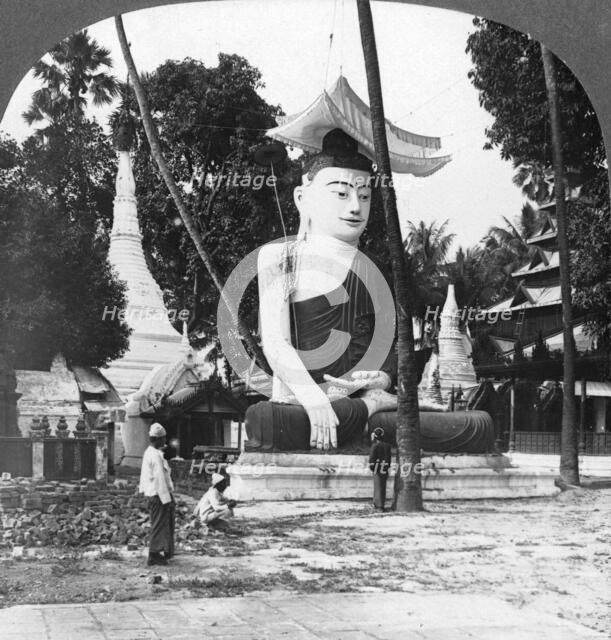 Buddha statue, Shwedagon Pagoda, Rangoon, Burma, 1908. Artist: Stereo Travel Co