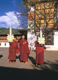 Buddhist monks, Tashichho Dzong, Thimphu, Bhutan. Creator: Vivienne Sharp