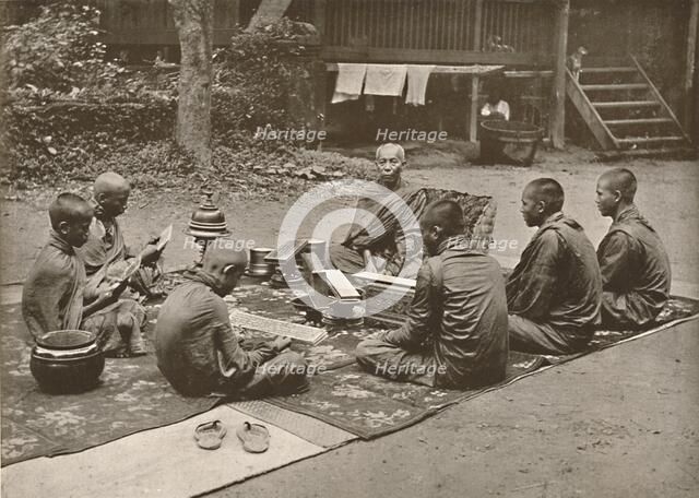 'Buddhist Priest with Pupils', 1900. Creator: Unknown.