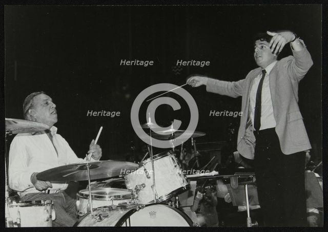 Buddy Rich and conductor Andrew Litton, Royal Festival Hall, London, June 1985. Creator: Denis Williams.