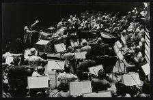 Buddy Rich and the Royal Philharmonic Orchestra in concert at the Royal Festival Hall, London, 1985. Artist: Denis Williams