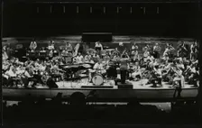 Buddy Rich and the Royal Philharmonic Orchestra in concert at the Royal Festival Hall, London, 1985. Creator: Denis Williams