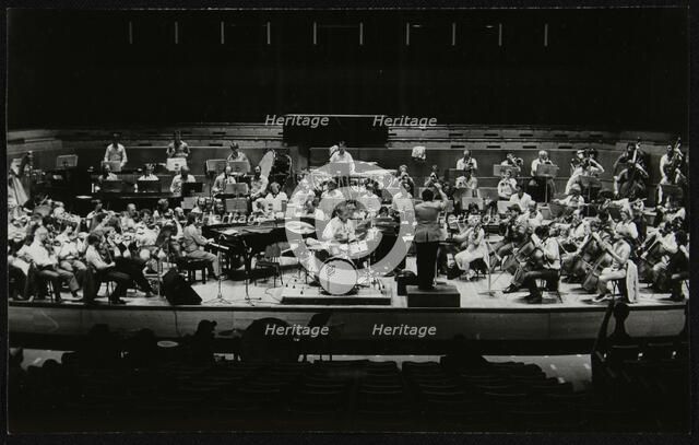 Buddy Rich and the Royal Philharmonic Orchestra in concert at the Royal Festival Hall, London, 1985. Artist: Denis Williams