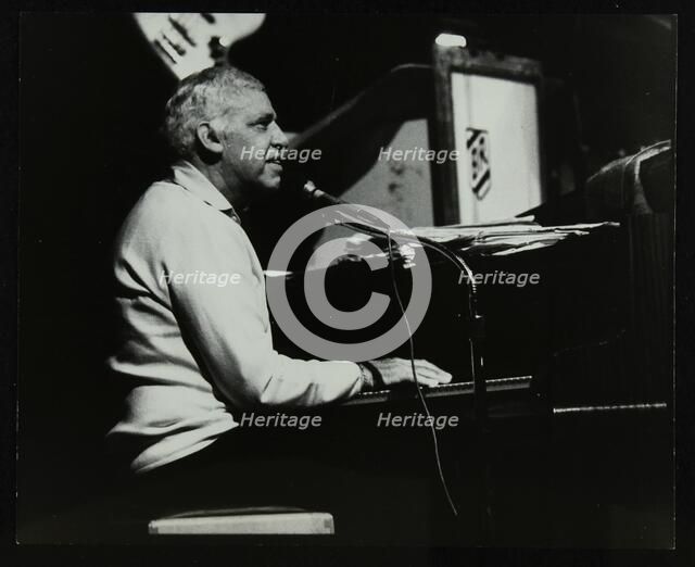Buddy Rich on piano on his last appearance at the Forum Theatre, Hatfield, Hertfordshire, 1986. Artist: Denis Williams