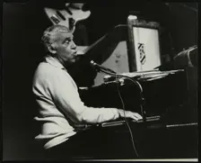 Buddy Rich playing the piano, Forum Theatre, Hatfield, Hertfordshire, November 1986. Creator: Denis Williams