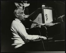 Buddy Rich playing the piano, Forum Theatre, Hatfield, Hertfordshire, November 1986. Creator: Denis Williams