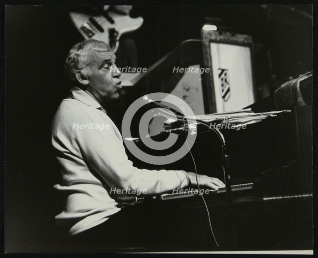 Buddy Rich playing the piano, Forum Theatre, Hatfield, Hertfordshire, November 1986. Creator: Denis Williams.