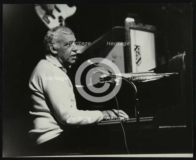Buddy Rich playing the piano, Forum Theatre, Hatfield, Hertfordshire, November 1986. Creator: Denis Williams.
