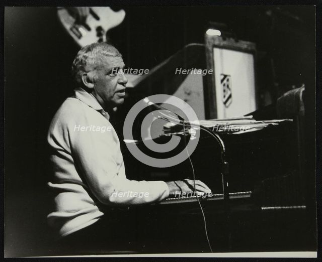 Buddy Rich playing the piano, Forum Theatre, Hatfield, Hertfordshire, November 1986. Creator: Denis Williams.