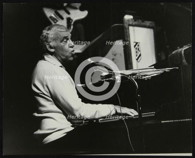 Buddy Rich playing the piano, Forum Theatre, Hatfield, Hertfordshire, November 1986. Artist: Denis Williams