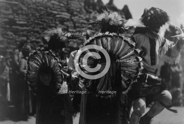 Buffalo dancers, c1905. Creator: Edward Sheriff Curtis.