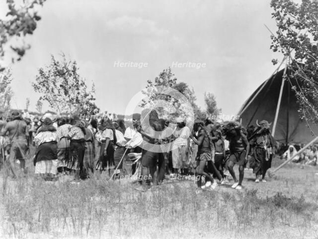 Buffalo Society, animal dance-Cheyenne, c1927. Creator: Edward Sheriff Curtis.