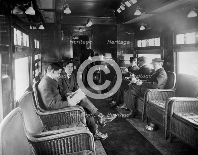 Buffet library car on a deluxe overland limited train, between 1910 and 1920. Creator: William H. Jackson.