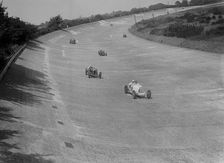 Bugatti T37s of Eileen Ellison and S Smith on Byfleet Banking, BARC meeting, Brooklands, 1933. Artist: Bill Brunell