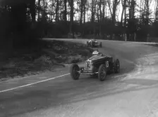 Bugatti Type 35B of Jock Leith leading a Riley Brooklands at Donington Park, Leicestershire, 1935. Artist: Bill Brunell