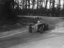 Bugatti Type 35B of Jock Leith leading a Riley Brooklands at Donington Park, Leicestershire, 1935. Artist: Bill Brunell
