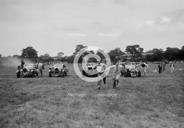 Bugatti Type 43 and 44 and a Bentley taking part in the Bugatti Owners Club gymkhana, 5 July 1931. Artist: Bill Brunell.