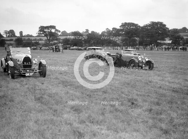 Bugatti Type 43, Aston Martin and Alvis FWD at the Bugatti Owners Club gymkhana, 5 July 1931. Artist: Bill Brunell.