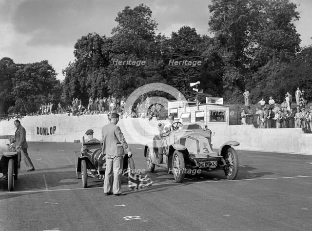 Bugatti and Renault on the start line for the Vintage Cup, Crystal Palace, 1939. Artist: Bill Brunell.