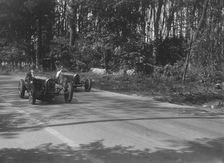 Bugattis of Jock Leith and Teddy Rayson racing at Donington Park, Leicestershire, 1935. Artist: Bill Brunell