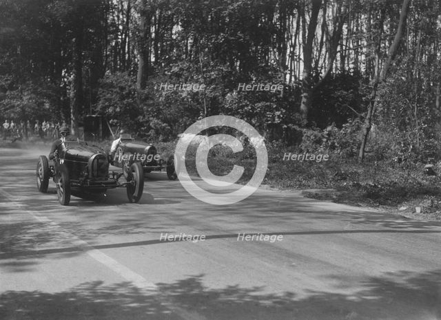 Bugattis of Jock Leith and Teddy Rayson racing at Donington Park, Leicestershire, 1935. Artist: Bill Brunell.