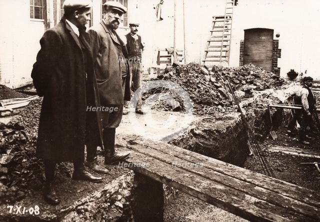 Building foremen examine work on site at Rowntree factory, Haxby Road,York, Yorkshire, 1908. Artist: Unknown