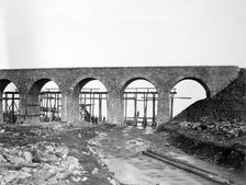 Building of a Bridge Over a Road, 1900-1904. Creator: Unknown