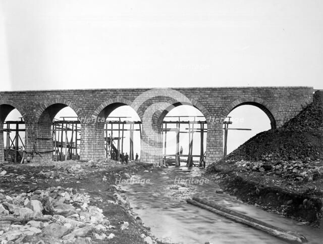 Building of a Bridge Over a Road, 1900-1904. Creator: Unknown.