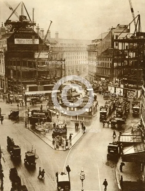 Building work at Piccadilly Circus in London, 1926, (1935). Creator: Unknown.