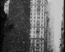 Building with American Flags in the Foreground, 1933. Creator: British Pathe Ltd