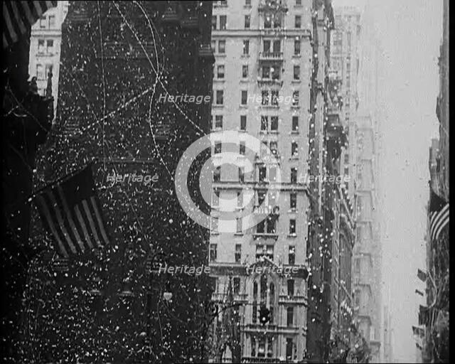 Building with American Flags in the Foreground, 1933. Creator: British Pathe Ltd.