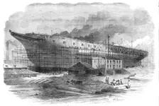 Building the great steam-frigate "Warrior" at the Thames Ironworks, Blackwall, 1860. Creator: Smyth