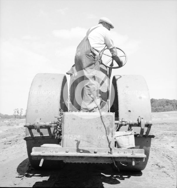 Building the road to the community factory, Hightstown, New Jersey, 1936. Creator: Dorothea Lange.