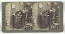 Building up an Underwood Patent Extension Stereograph Cabinet, - in a home Library, 1901. Creator: Underwood & Underwood