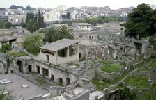 Buildings of Herculaneum with houses of the modern town of Ercolano above, Italy