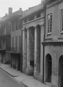 Buildings, including the Arsenal, along St. Peter Street, New Orleans, between 1920 and 1926. Creator: Arnold Genthe