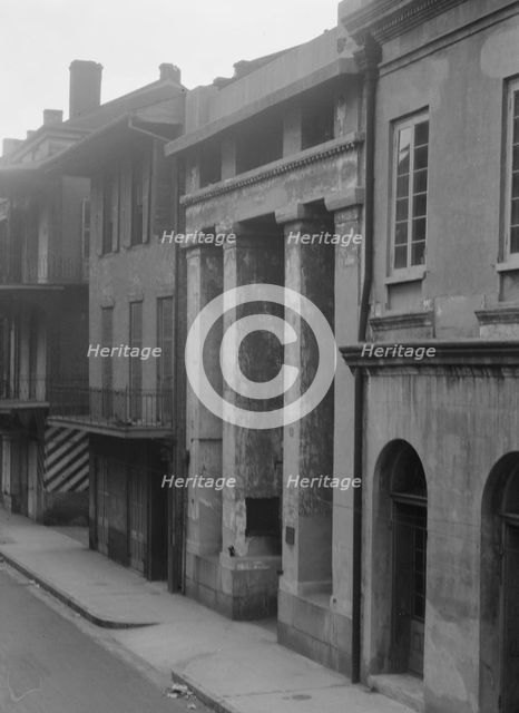 Buildings, including the Arsenal, along St. Peter Street, New Orleans, between 1920 and 1926. Creator: Arnold Genthe.