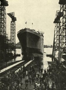 Built in a Belfast Shipyard - The launching of the Edinburgh Castle, a fine ship built recently for Creator: Unknown