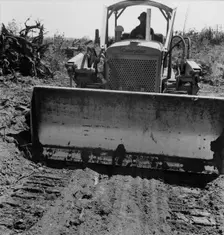 Bulldozer equipped with grader..., Nieman farm, near Vader, Lewis County, Western Washington, 1939. Creator: Dorothea Lange