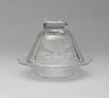 Bullet & Emblem pattern covered butter dish, 1870/1900. Creator: Unknown