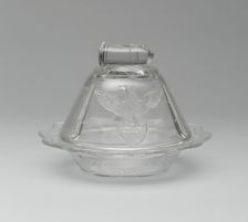 Bullet & Emblem pattern covered butter dish, 1870/1900. Creator: Unknown