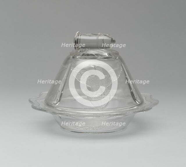 Bullet & Emblem pattern covered butter dish, 1870/1900. Creator: Unknown.