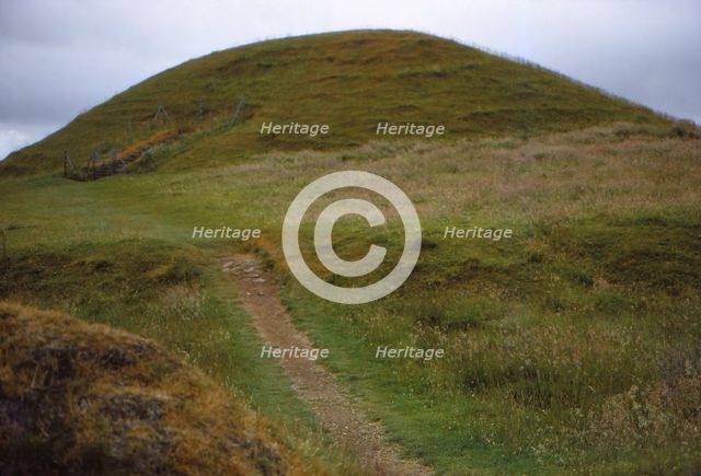 Burial cairn at Maes Howe, Orkney, Scotland, 20th century. Artist: CM Dixon.