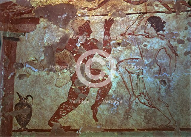 Burial chamber of the necropolis of Tarquinia, mural painting representing two dancers.